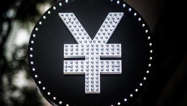 A foreign currency exchange booth sign showing the symbol for the Chinese yuan is seen in Hong Kong on August 13, 2015 - Sputnik International