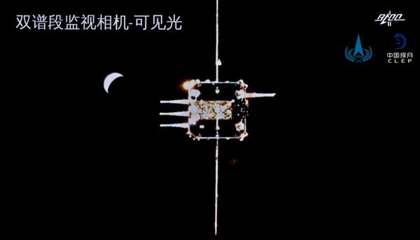 Chang'e-5 ascender is seen from the orbiter-returner combination in this handout image provided by China National Space Administration (CNSA) 6 December 2020.  - Sputnik International