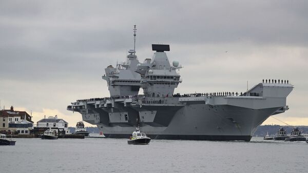 The new British aircraft carrier HMS Prince of Wales arrives at Portsmouth Naval Base after its first sea trials, in Portsmouth, southern England, Saturday Nov. 16, 2019 - Sputnik International