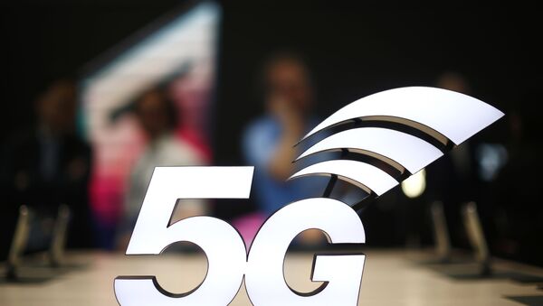 FILE - This 25 February 2019 file photo shows a banner of the 5G network displayed during the Mobile World Congress wireless show, in Barcelona, Spain.  - Sputnik International