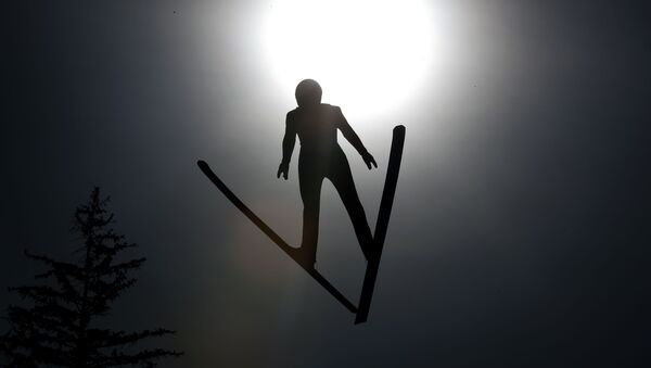 Finland's Leevi Mutru soars through the air during training for the Nordic Combined HS130, at the Nordic ski World Championships in Innsbruck, Austria, Wednesday, Feb. 20, 2019 - Sputnik International