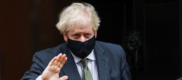 Britain's Prime Minister Boris Johnson leaves Downing Street in London Britain's Prime Minister Boris Johnson leaves Downing Street in London - Sputnik International