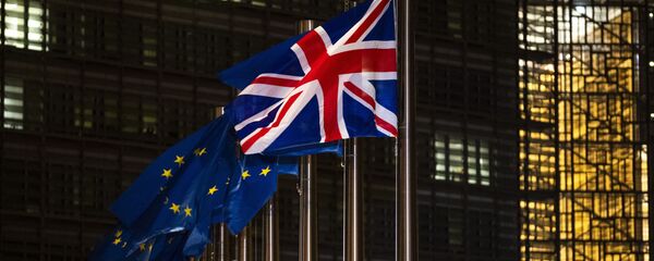 The Union Flag and European Union flags flap in the wind prior a meeting between European Commission President Ursula von der Leyen and British Prime Minister Boris Johnson at EU headquarters in Brussels, Wednesday, Dec. 9, 2020 - Sputnik International