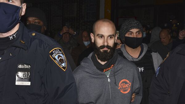 Mac's Public House co-owner Danny Presti is taken away in handcuffs after being arrested by New York City sheriff's deputies, Tuesday, Dec. 1, 2020, in the Staten Island borough of New York - Sputnik International