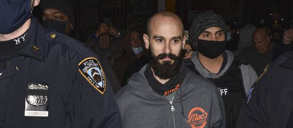 Mac's Public House co-owner Danny Presti is taken away in handcuffs after being arrested by New York City sheriff's deputies, Tuesday, Dec. 1, 2020, in the Staten Island borough of New York - Sputnik International