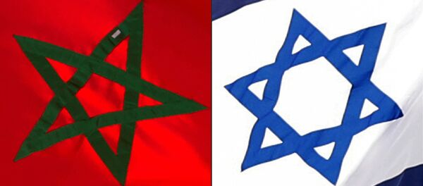 (COMBO) This combination of file pictures created on December 10, 2020 shows a Moroccan flag off the coasts of the city of Cayenne on March 21, 2012 and an Israeli national flag on September 23, 2020 - Sputnik International