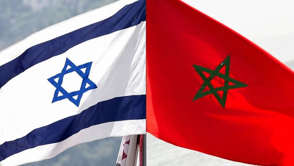 This combination of file pictures created on December 10, 2020 shows a Moroccan flag off the coasts of the city of Cayenne on March 21, 2012 and an Israeli national flag on September 23, 2020 - Sputnik International