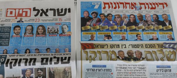 This picture taken on December 11, 2020 in Jerusalem shows Israeli newspapers' front page titles about the announcement that Israel is to establish diplomatic relations with Morocco. - Outgoing President Donald Trump's double announcement of a normalisation of ties between Morocco and Israel and US recognition of Moroccan sovereignty over Western Sahara has prompted mixed reactions. In a statement by the royal palace, Morocco's King Mohammed VI confirmed on December 10 that his country would resume official contacts.... and diplomatic relations with minimal delay with Israel, two decades after the two countries closed liaison offices. This picture taken on December 11, 2020 in Jerusalem shows Israeli newspapers' front page titles about the announcement that Israel is to establish diplomatic relations with Morocco. - Outgoing President Donald Trump's double announcement of a normalisation of ties between Morocco and Israel and US recognition of Moroccan sovereignty over Western Sahara has prompted mixed reactions. In a statement by the royal palace, Morocco's King Mohammed VI confirmed on December 10 that his country would resume official contacts.... and diplomatic relations with minimal delay with Israel, two decades after the two countries closed liaison offices. - Sputnik International