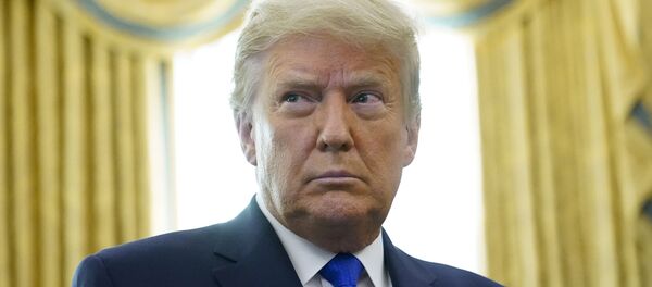 In this Dec. 7, 2020 photo President Donald Trump in the Oval Office of the White House in Washington. Trump has announced that Israel and Morocco will normalize relations in the latest achievement of his administration's press to push Arab-Israeli peace. - Sputnik International