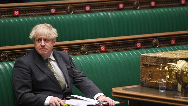 Britain's Prime Minister Boris Johnson looks on during Question Period at the House of Commons in London, Britain December 9, 2020. - Sputnik International