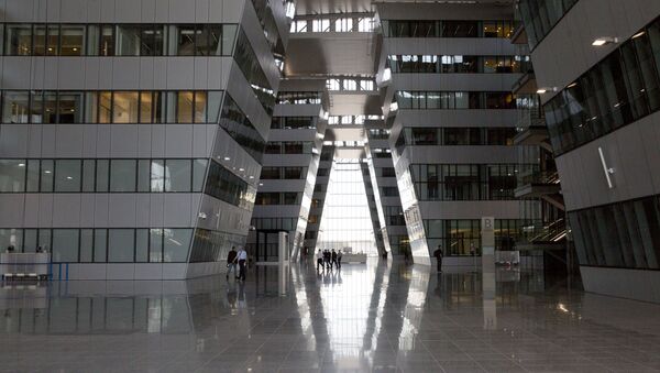 People walk through the Agora atrium at the new NATO headquarters in Brussels on Thursday, April 19, 2018. - Sputnik International