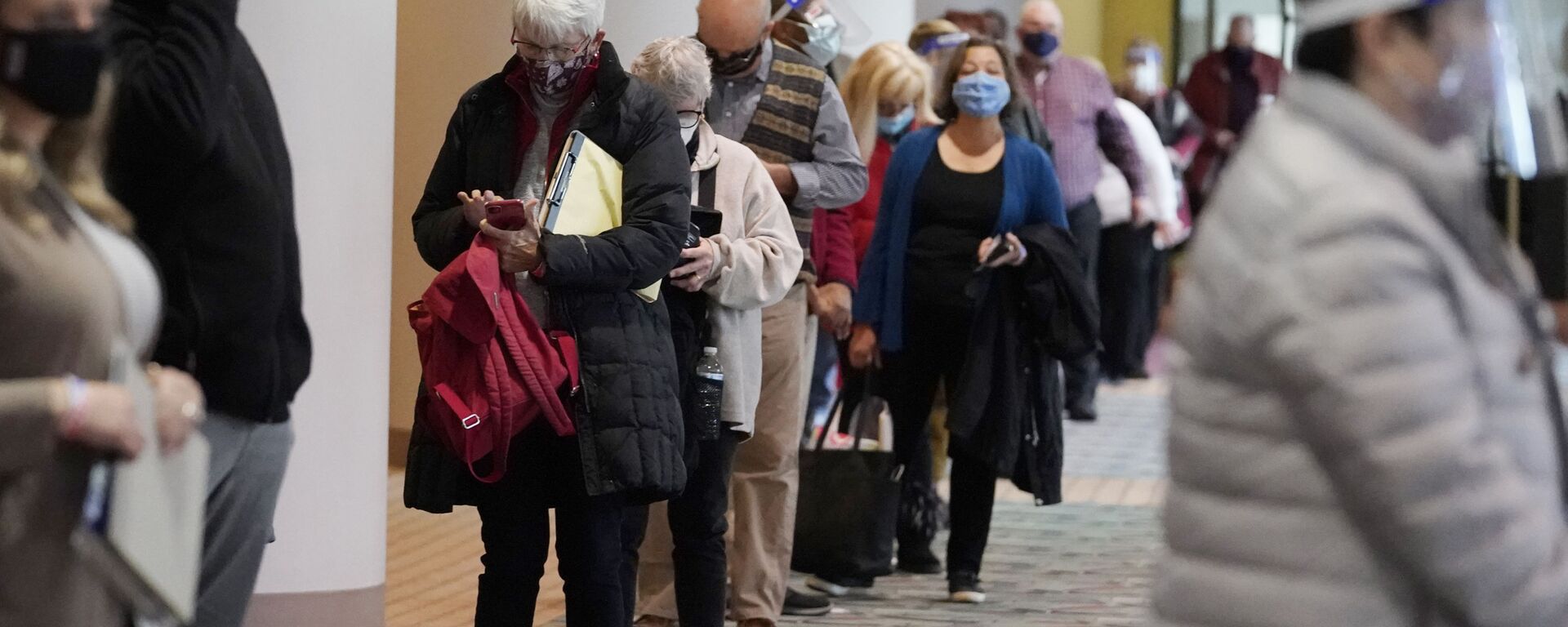 FILE - In this Nov. 20, 2020, file photo, people line up for a Milwaukee hand recount of the presidential election at the Wisconsin Center, in Milwaukee - Sputnik International, 1920, 13.02.2022