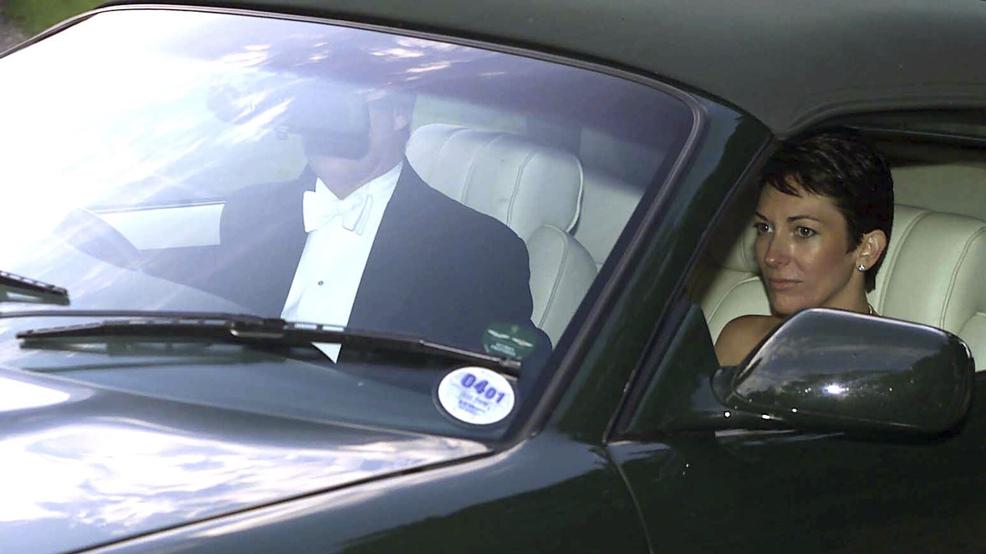 n this Sept. 2, 2000 file photo, British socialite Ghislaine Maxwell, driven by Britain's Prince Andrew leaves the wedding of a former girlfriend of the prince, Aurelia Cecil, at the Parish Church of St Michael in Compton Chamberlayne near Salisbury, England. The FBI said Thursday July 2, 2020, Ghislaine Maxwell, who was accused by many women of helping procure underage sex partners for Jeffrey Epstein, has been arrested in New Hampshire.  - Sputnik International, 1920, 17.01.2022
