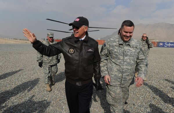 US Vice President Joe Biden (L) arrives for a visit at an Afghan National Army (ANA) training center in Kabul on 11 January, 2011. - Sputnik International