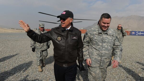 US Vice President Joe Biden (L) arrives for a visit at an Afghan National Army (ANA) training center in Kabul on January 11, 2011.  - Sputnik International