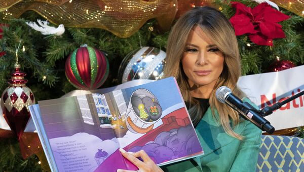 First lady Melania Trump reads a Christmas book titled, Oliver the Ornament Meets Marley and Joan and Abbey, at Children's National Hospital, Tuesday, Dec. 15, 2020, in Washington - Sputnik International