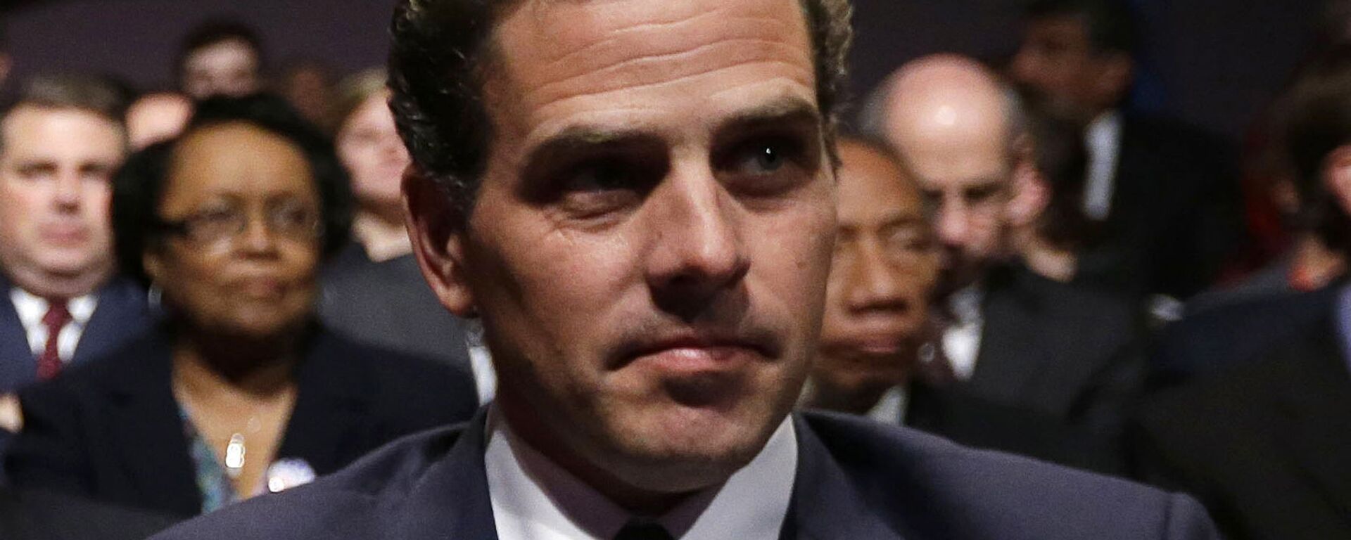 In this Oct. 11, 2012, file photo, Hunter Biden waits for the start of the his father's, Vice President Joe Biden's, debate at Centre College in Danville, Ky. In 2014, then-Vice President Joe Biden was at the forefront of American diplomatic efforts to support Ukraine's fragile democratic government as it sought to fend off Russian aggression and root out corruption. So it raised eyebrows when Biden's son Hunter was hired by a Ukrainian gas company. President Donald Trump prodded Ukraine's president to help him investigate any corruption related to Joe Biden, now one of the top Democrats seeking to defeat Trump in 2020 - Sputnik International, 1920, 25.03.2022