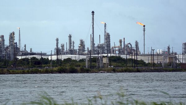 A refinery is seen along the water, Wednesday, Aug. 26, 2020, in Port Arthur, Texas. - Sputnik International