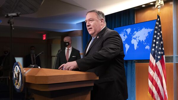 Secretary of State Mike Pompeo arrives to speak during a media briefing, Tuesday, Nov. 10, 2020, at the State Department in Washington.  - Sputnik International