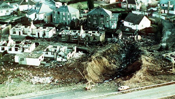 Pan Am crash. Trail of Disaster - Agreat gouge of earth and the wrecked houses of the village of Lockerbie Thursday, January 28, 1988, show the path of the crashing Pan Am Boeing 747 airliner. The jetliner crashed Wednesday night, killing all 258 poeple on board, and an unknown number on the ground.  - Sputnik International