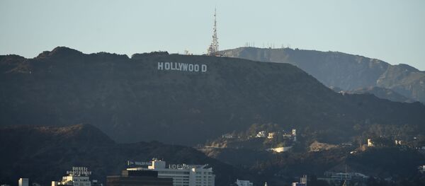 The Hollywood sign is seen above Los Angeles, Friday, July 31, 2020, in Los Angeles. The Hollywood sign is seen above Los Angeles, Friday, July 31, 2020, in Los Angeles. - Sputnik International