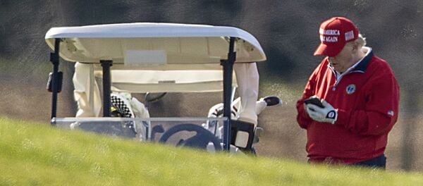 US President Donald Trump makes a phone call as he golfs at Trump National Golf Club on November 26, 2020 in Sterling, Virginia US President Donald Trump makes a phone call as he golfs at Trump National Golf Club on November 26, 2020 in Sterling, Virginia - Sputnik International