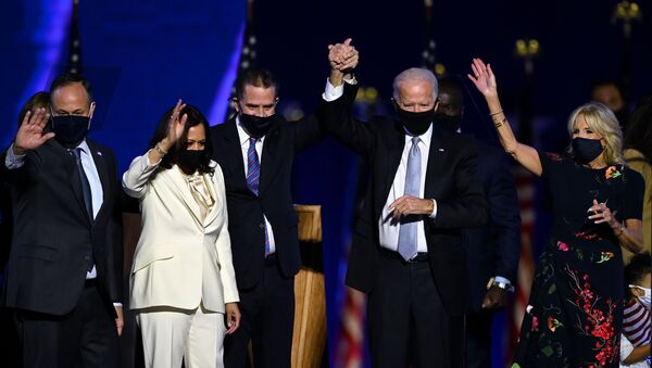(From L) Husband of Vice President-elect Kamala Harris, Douglas Emhoff, Vice President-elect Kamala Harris, Hunter Biden, US President-elect Joe Biden and wife Jill Biden salute the crowd after delivering remarks in Wilmington, Delaware, on November 7, 2020, after being declared the winners of the presidential election - Sputnik International