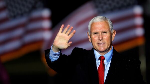 U.S. Vice President Mike Pence waves to supporters at the end of a rally in Kinston, North Carolina, U.S., October 25, 2020 - Sputnik International