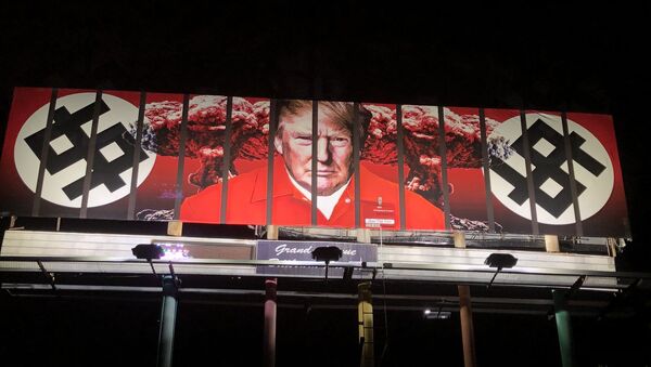 A new billboard in Phoenix shows President Donald Trump behind bars wearing a prison jumpsuit - Sputnik International