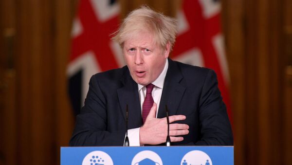 Britain's Prime Minister Boris Johnson speaks during a news conference in response to the ongoing situation with the coronavirus disease (COVID-19) pandemic, inside 10 Downing Street, London ,Britain, December 19, 2020. - Sputnik International