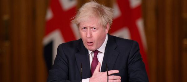 Britain's Prime Minister Boris Johnson speaks during a news conference in response to the ongoing situation with the coronavirus disease (COVID-19) pandemic, inside 10 Downing Street, London, 19 December 2020. - Sputnik International