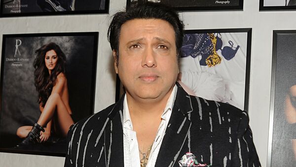 Indian Bollywood actor Govinda poses as he attends the launch of Daboo Ratnani's ‘Celebrity Calendar 2017’ in Mumbai late January 11, 2017 - Sputnik International
