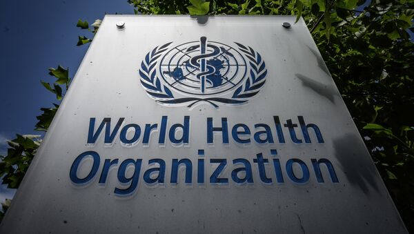 This photograph taken on 3 July 2020, shows a World Health Organization (WHO) sign at their headquarters in Geneva, amidst the COVID-19 outbreak, caused by the novel coronavirus. - Sputnik International