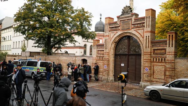 Journalists are seen on October 10, 2019 at synagogue in Halle, eastern Germany, one day after the attack where two people were shot dead - Sputnik International