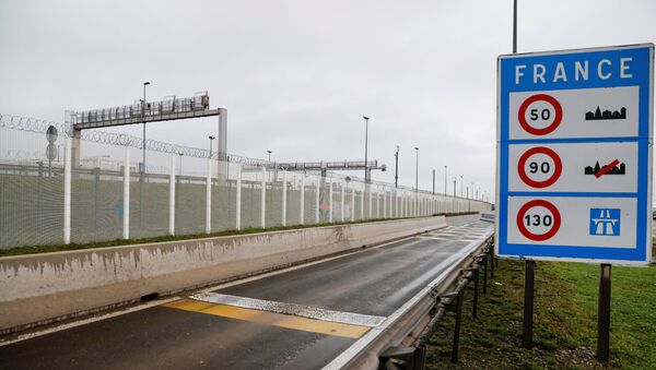An empty road where lorries from Britain usually leave the Eurotunnel terminal to join the highway in Coquelles near Calais, northern France, after France barred all traffic from the United Kingdom, for 48 hours from Sunday night, over fears of a new strain of the coronavirus, amid the spread of the coronavirus disease (COVID-19) in France, 22 December 2020. - Sputnik International
