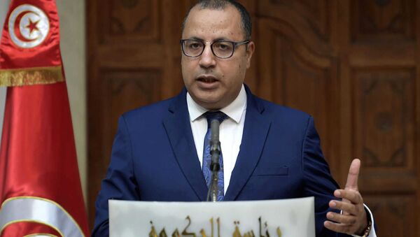 A photo of Tunisian Prime Minister Hichem Mechichi during his press conference on Tuesday, posted on Twitter on December 22, 2020 - Sputnik International