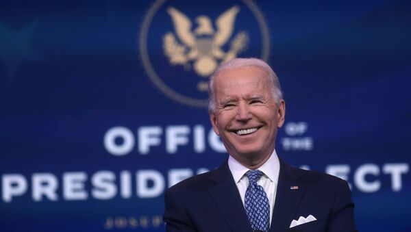 U.S. President-elect Joe Biden reacts as he answers questions from the news media after speaking about the recent massive cyber attack against the U.S. and also other Biden administration goals in Wilmington, Delaware, U.S., December 22, 2020 - Sputnik International