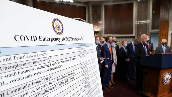 A display is seen as bipartisan members of the Senate and House gather to announce a framework for fresh coronavirus disease (COVID-19) relief legislation at a news conference on Capitol Hill in Washington, U.S., December 1, 2020 - Sputnik International