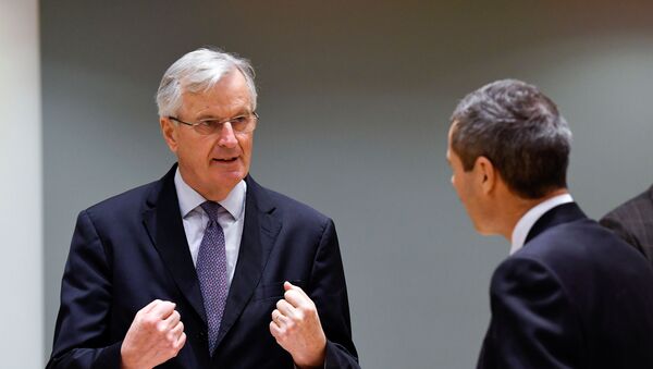 European Union's chief Brexit negotiator Michel Barnier gestures as he speaks with Ambassador Michael Clauss, Permanent Representative of Germany to the EU, during a meeting of the Committee of the Permanent Representatives of the Governments of the Member States to the European Union (COREPER) in Brussels, Belgium December 22, 2020.  - Sputnik International