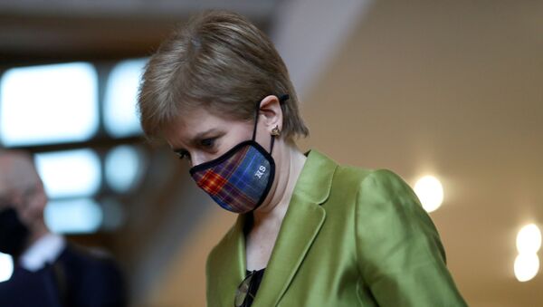 Scottish First Minister Nicola Sturgeon arrives for the First Minister's Questions at the parliament in Edinburgh, Scotland, Britain December 10, 2020. - Sputnik International
