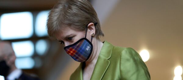 Scottish First Minister Nicola Sturgeon arrives for the First Minister's Questions at the parliament in Edinburgh, Scotland, Britain December 10, 2020. - Sputnik International