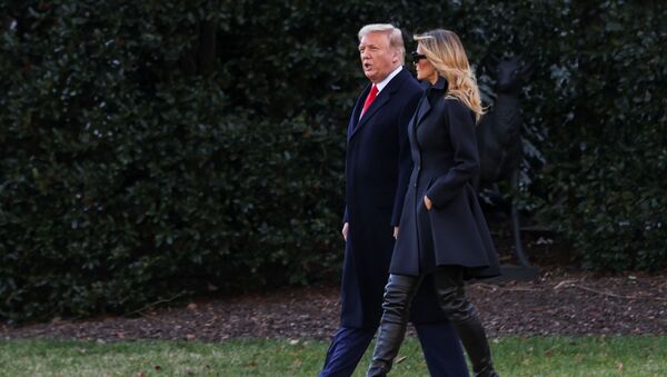 US President Donald Trump, accompanied by first lady Melania Trump, departs from the White House for holiday travel to his home in Florida, in Washington, US, 23 December 2020.  - Sputnik International