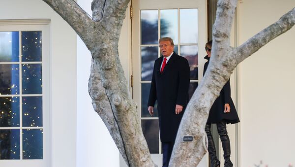 U.S. President Donald Trump, accompanied by first lady Melania Trump, departs from the White House for holiday travel to his home in Florida, in Washington, U.S., December 23, 2020. - Sputnik International