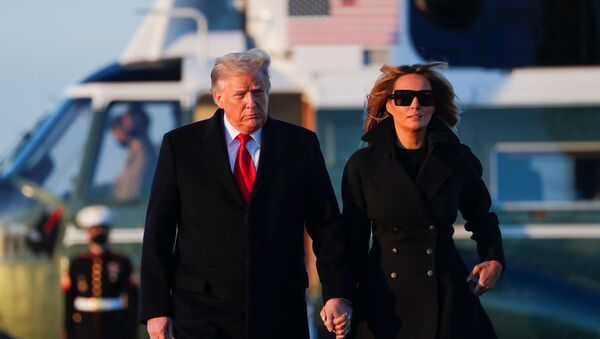 U.S. President Donald Trump and first lady Melania Trump prepare to board Air Force One at Joint Base Andrews in Maryland, U.S., December 23, 2020. - Sputnik International