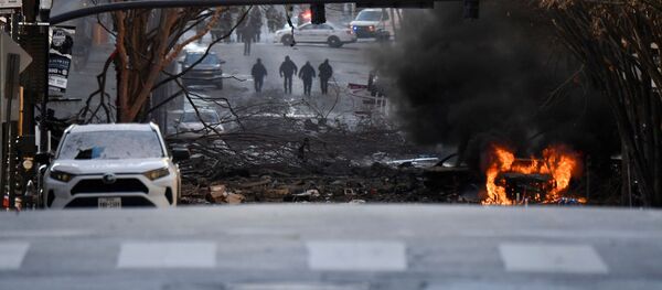 A vehicle burns near the site of an explosion in the area of Second and Commerce in Nashville, Tennessee, U.S. December 25, 2020. Andrew Nelles/Tennessean.com/USA TODAY NETWORK via REUTERS. A vehicle burns near the site of an explosion in the area of Second and Commerce in Nashville, Tennessee, U.S. December 25, 2020. Andrew Nelles/Tennessean.com/USA TODAY NETWORK via REUTERS. - Sputnik International
