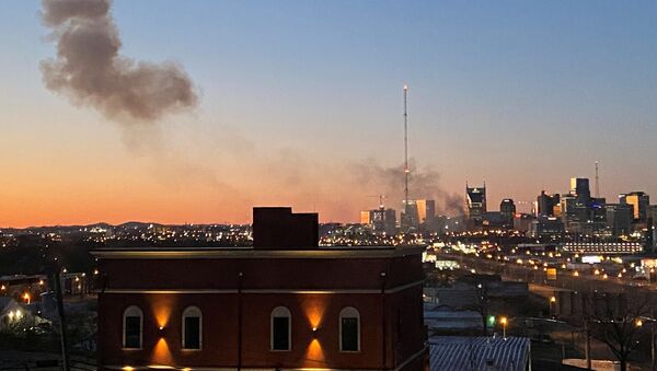 Smoke billows from the site of an explosion in the area of Second and Commerce in Nashville, Tennessee, U.S. December 25, 2020. - Sputnik International