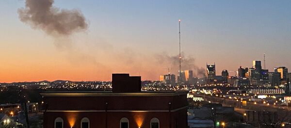 Smoke billows from the site of an explosion in the area of Second and Commerce in Nashville, Tennessee, U.S. December 25, 2020. - Sputnik International