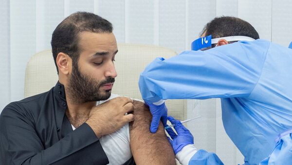 Saudi Crown Prince Mohammed bin Salman gets a dose of a coronavirus disease (COVID-19) vaccine in Riyadh, Saudi Arabia, December 25, 2020. - Sputnik International