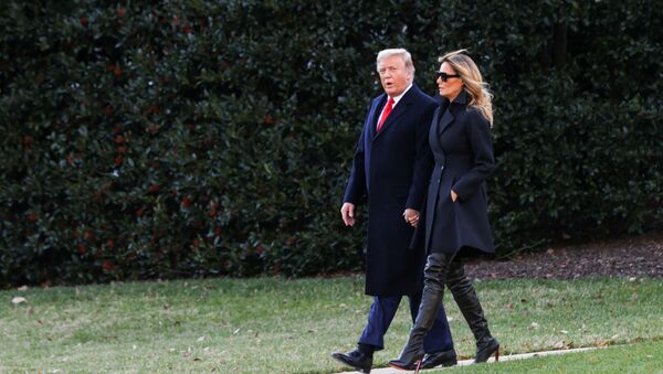 U.S. President Donald Trump, accompanied by first lady Melania Trump, departs from the White House for holiday travel to his home in Florida, in Washington, U.S., December 23, 2020.  - Sputnik International