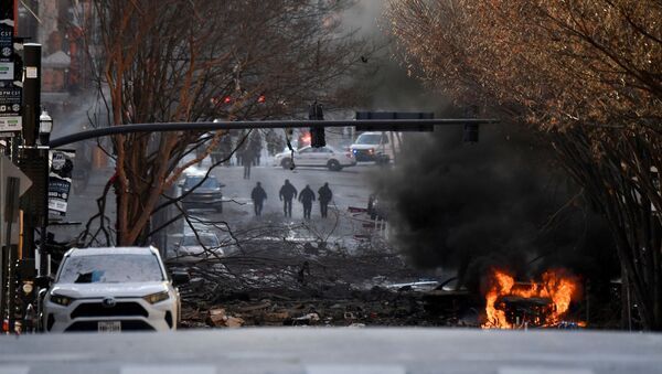 A vehicle burns near the site of an explosion in the area of Second and Commerce in Nashville, Tennessee, U.S. December 25, 2020. - Sputnik International